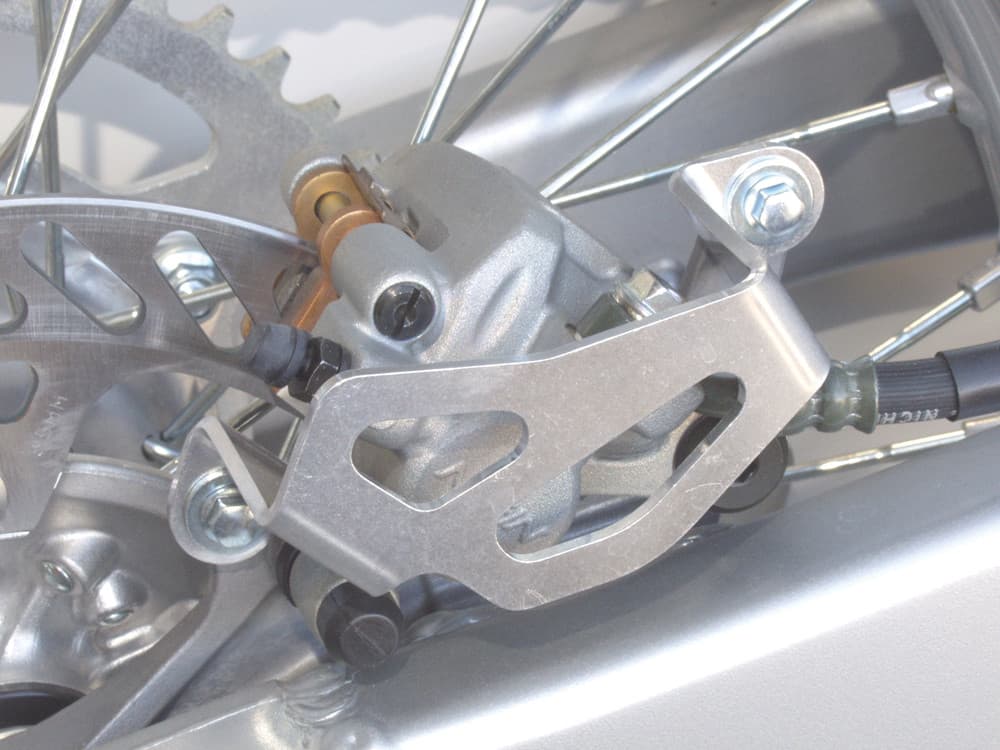 ALUM REAR CALIPER GUARD KX/KDX/KLX
